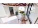 This covered patio features tile floors, ample seating, an arched entrance and a garage at 3830 Bal Harbor Blvd # 5, Punta Gorda, FL 33950