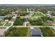 Aerial perspective showing the home's position within a peaceful, residential neighborhood at 5452 Montego Ln, Port Charlotte, FL 33981