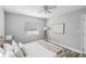 Well-lit bedroom featuring a queen bed, neutral decor, and ample natural light at 5452 Montego Ln, Port Charlotte, FL 33981