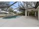 This screened in pool area also offers a spacious covered deck perfect for relaxation at 5452 Montego Ln, Port Charlotte, FL 33981