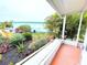 Tropical landscaping surrounds this single-story home at 6642 Acacia Ct, North Port, FL 34287