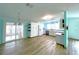 Bright kitchen with white cabinets and new appliances at 6642 Acacia Ct, North Port, FL 34287