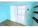 View of bright kitchen featuring new sliding glass doors at 6642 Acacia Ct, North Port, FL 34287