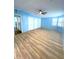 The bedroom includes three closets, hardwood floors, and natural light at 6642 Acacia Ct, North Port, FL 34287