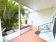Charming covered patio with lush landscaping at 6642 Acacia Ct, North Port, FL 34287