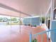 Spacious covered patio with view of tropical landscaping at 6642 Acacia Ct, North Port, FL 34287