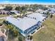 Aerial view of the house showcasing the pool and screened-in lanai at 2275 Kenya Ln, Punta Gorda, FL 33983