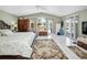 Spacious main bedroom features tile floors, and a sitting area with views of the water at 2275 Kenya Ln, Punta Gorda, FL 33983
