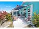 Outdoor patio with awning overlooking a lush landscape at 2275 Kenya Ln, Punta Gorda, FL 33983