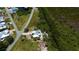 Charming single-story home on a corner lot, surrounded by lush greenery and mature trees at 24362 Yacht Club Blvd, Punta Gorda, FL 33955