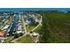 Stunning aerial view of a waterfront community with canal access and beautiful Florida mangroves at 24362 Yacht Club Blvd, Punta Gorda, FL 33955