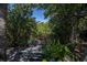 Scenic backyard view with lush greenery and peaceful waterway at 24362 Yacht Club Blvd, Punta Gorda, FL 33955