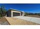 Inviting home featuring a two-car garage and a well-manicured lawn at 24362 Yacht Club Blvd, Punta Gorda, FL 33955