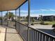 Screened balcony with scenic views of the water, featuring ample space for outdoor relaxation and enjoyment at 25188 Marion Ave # F201, Punta Gorda, FL 33950