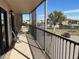 Spacious tiled balcony with a view of the water, perfect for outdoor relaxation and enjoying the surroundings at 25188 Marion Ave # F201, Punta Gorda, FL 33950