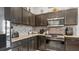 Contemporary kitchen featuring stainless steel appliances, sleek countertops, and stylish backsplash, creating a culinary haven at 2668 Clovelon St, North Port, FL 34291