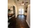 View of the kitchen area featuring tiled floors and stainless steel appliances at 18085 Wintergarden Ave, Port Charlotte, FL 33948