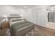 Comfortable bedroom with a large window and a view of the modern closet at 3429 Sleepy Hollow Ln, Punta Gorda, FL 33950