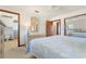 Serene bedroom with ensuite bath, a mirrored closet, and coordinating decor for a comfortable and stylish living at 520 Boardman Dr, Punta Gorda, FL 33950
