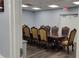 Conference room featuring a long ornate wood table and seating for ten at 6671 Keystone Ct, North Port, FL 34287