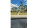 View of a charming gazebo nestled within a lush green space, inviting relaxation and enjoyment at 6671 Keystone Ct, North Port, FL 34287
