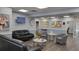 Comfortable lobby area featuring a variety of seating options and stylish decor at 6671 Keystone Ct, North Port, FL 34287