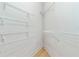 Walk-in closet with wire shelving and hardwood floors at 126 Peckham Sw St, Port Charlotte, FL 33952