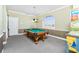Game room featuring a pool table, game machine, and window at 126 Peckham Sw St, Port Charlotte, FL 33952