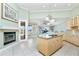 Open kitchen featuring an island, granite countertops, and a view of the Gathering room and backyard at 126 Peckham Sw St, Port Charlotte, FL 33952