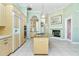 Spacious kitchen featuring an island, modern appliances, and ample cabinet space at 126 Peckham Sw St, Port Charlotte, FL 33952