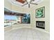 Living room area featuring backyard water views from a large bay window at 126 Peckham Sw St, Port Charlotte, FL 33952