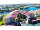 Low rise apartment complex with tile roof, covered parking, and waterfront views at 2601 W Marion Ave # 45C, Punta Gorda, FL 33950