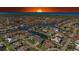 Expansive aerial view of a coastal community showcasing waterfront properties and intricate canal systems at 3307 Dominica Ct, Punta Gorda, FL 33950