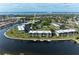 Waterfront condo community featuring manicured lawns, boat docks, and an inviting swimming pool in a beautiful coastal setting at 601 Shreve St # 46A, Punta Gorda, FL 33950
