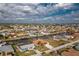 Panoramic aerial view of a waterfront community, highlighting canal access and neighborhood layout at 126 Peckham Sw St, Port Charlotte, FL 33952