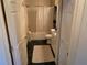 Bathroom featuring a shower-tub combo, a white vanity, and white wall and door trim at 3380 Maple Ter, Port Charlotte, FL 33952