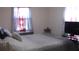 Bedroom with windows, television, and decorative bedding at 3380 Maple Ter, Port Charlotte, FL 33952