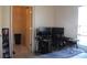 Comfortable bedroom with a dual-monitor computer workstation and access to a walk-in closet at 3380 Maple Ter, Port Charlotte, FL 33952
