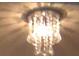 Close up of the gorgeous chandelier at 3380 Maple Ter, Port Charlotte, FL 33952