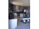 Contemporary kitchen with stainless steel appliances, sleek cabinets, and a modern design at 3380 Maple Ter, Port Charlotte, FL 33952