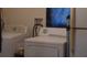 Bright laundry room features a washer and dryer for convenient laundry at 3380 Maple Ter, Port Charlotte, FL 33952