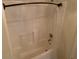 Neutral tiled shower with curtain at 3380 Maple Ter, Port Charlotte, FL 33952