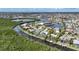 Waterfront property with pool and private dock along a scenic waterway; aerial view at 5028 San Massimo Dr, Punta Gorda, FL 33950