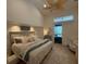 Comfortable main bedroom with soft lighting, and access to a private outdoor space at 5028 San Massimo Dr, Punta Gorda, FL 33950