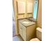 Compact bathroom vanity with granite countertop, sink, and white cabinets at 18938 Ayrshire Cir, Port Charlotte, FL 33948
