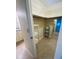 Spacious walk-in closet with shelving for optimal storage, keeping your wardrobe organized at 18938 Ayrshire Cir, Port Charlotte, FL 33948