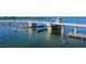 Detailed aerial photograph capturing the bridge, boats, pier and island in the distance at 1960 Oregon Trl # 2B, Englewood, FL 34224