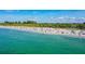 Gorgeous sunny aerial view of Manasota Key Beach featuring crystal blue ocean waters at 1960 Oregon Trl # 2B, Englewood, FL 34224