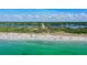 Gorgeous sunny aerial view of Manasota Key Beach featuring crystal blue ocean waters at 1960 Oregon Trl # 2B, Englewood, FL 34224