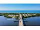 Scenic aerial view of the bridge leading to Manasota Key Beach with ocean and water views at 1960 Oregon Trl # 2B, Englewood, FL 34224